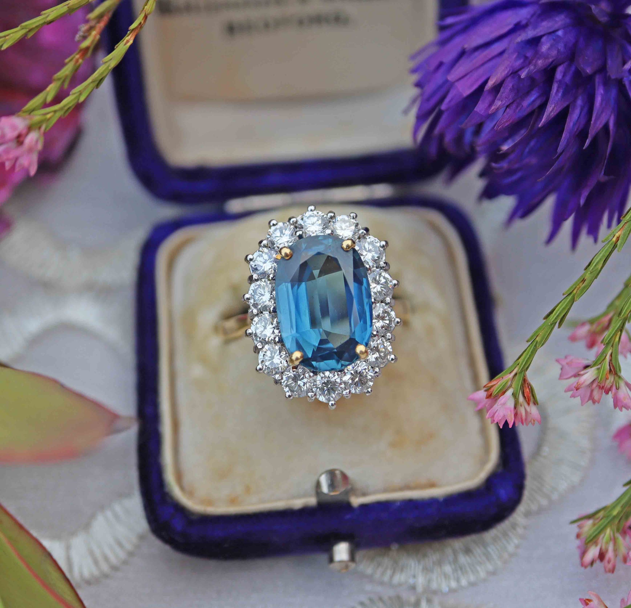 Princess Diana antique style sapphire engagement ring in a blue velvet antique ring box
