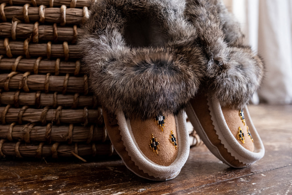 real rabbit fur wrap around a pair of genuine suede leather beaded moccasin slippers made in Canada
