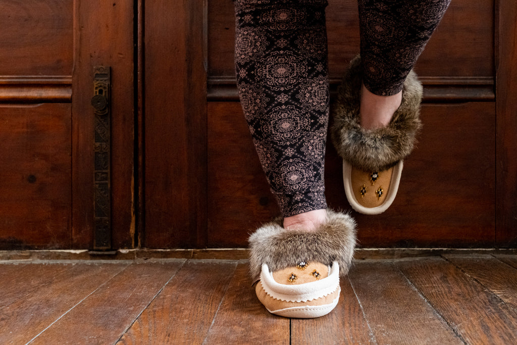 Laurentian Chief women's moccasin slippers with rabbit fur collar and sheepskin lining