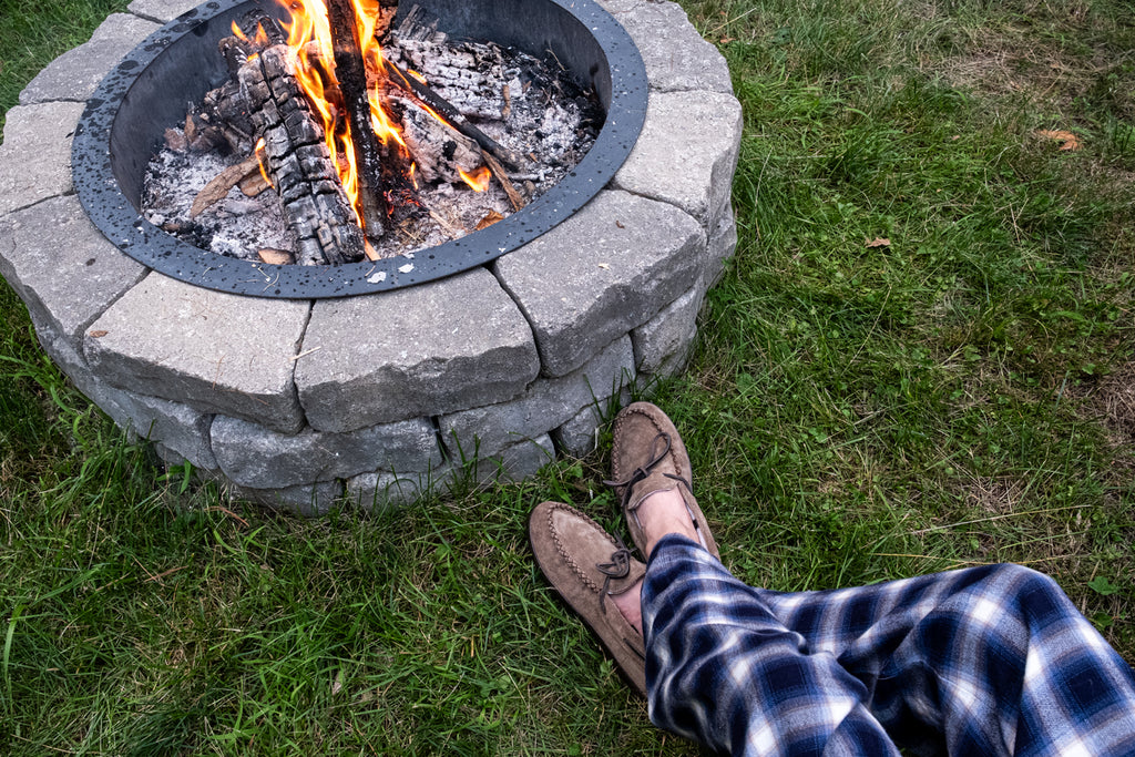 Campfire with pajamas and lined moccasins perfect for August nights as weather gets a bit cooler