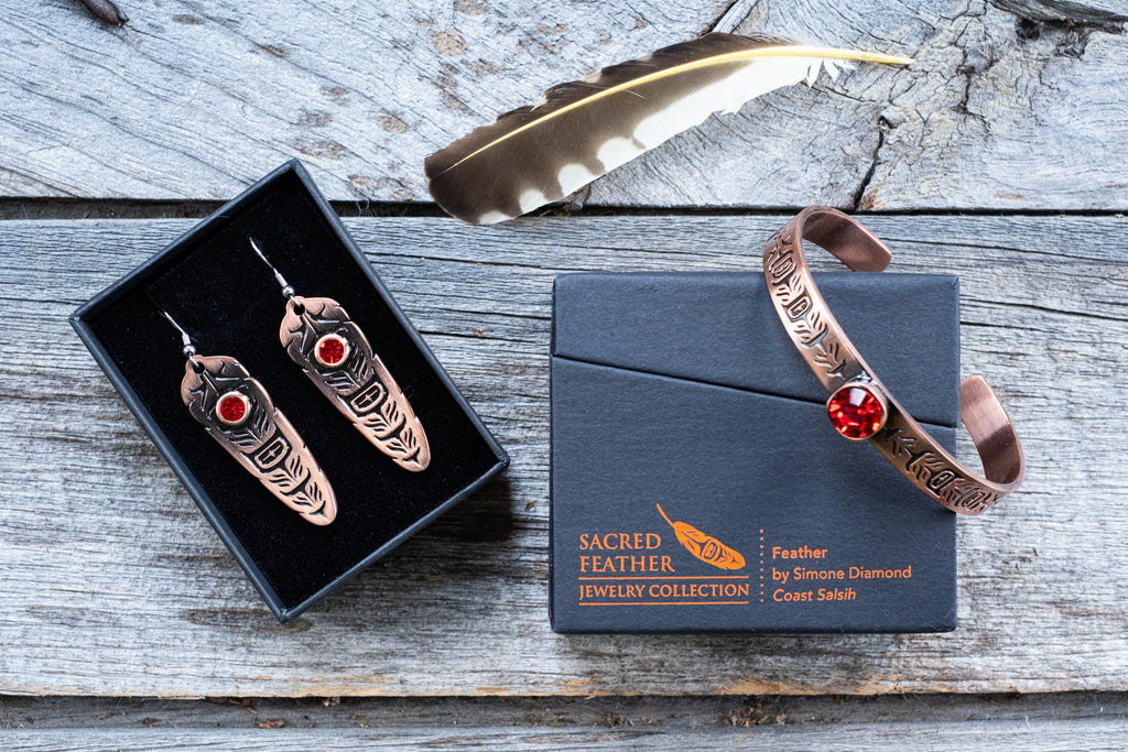 Matching bangle and copper drop earrings set with Indigenous art engraving