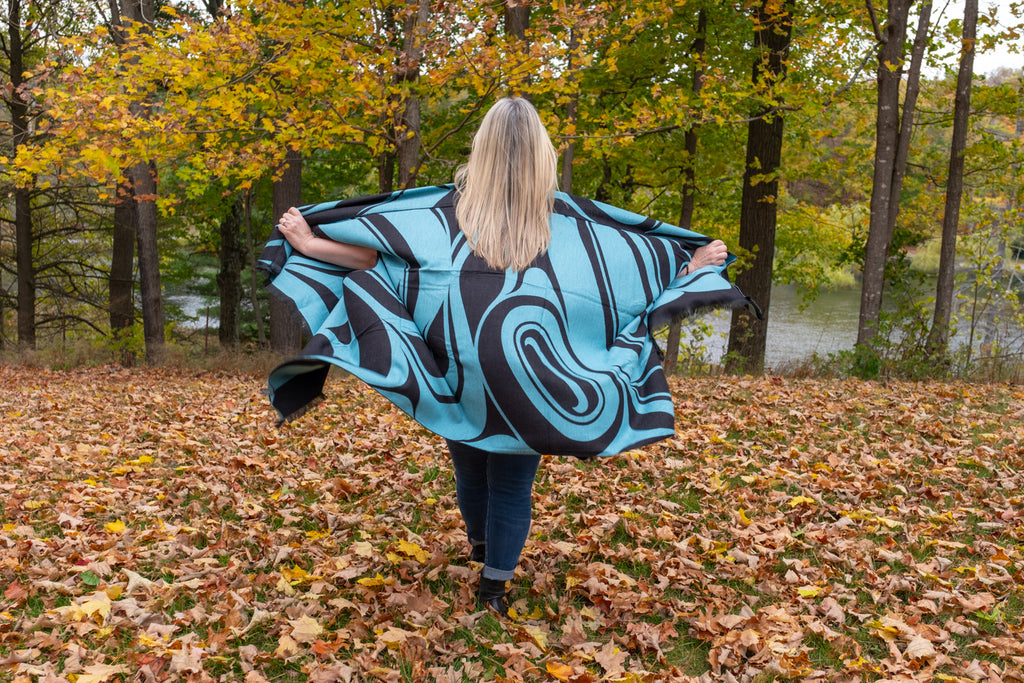 warm reversible fashion capes designed with Indigenous art pattern