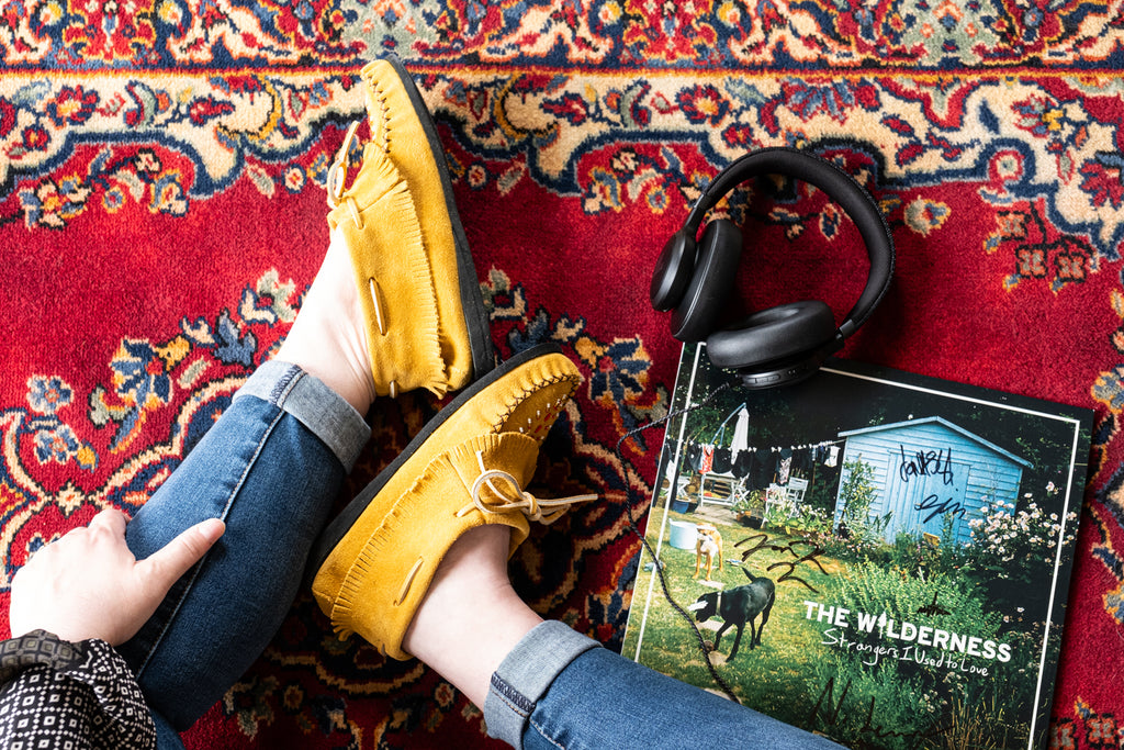 Vintage vinyl record with classic moccasins