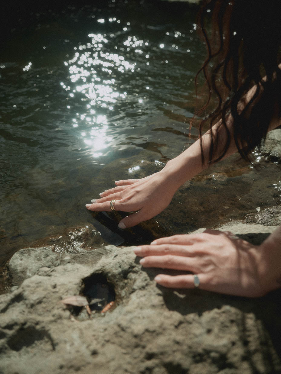 hands in water