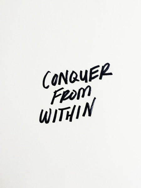 Text reading "Conquer from Within"
