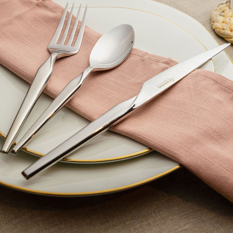 Luxury stainless steel cutlery on a dining table