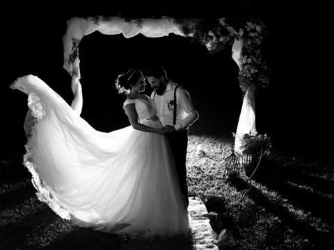 Black and white image of a bride and groom on their wedding day