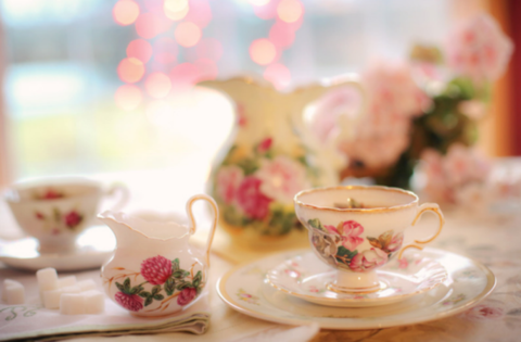 Pink theme afternoon tea, with teapot and scones