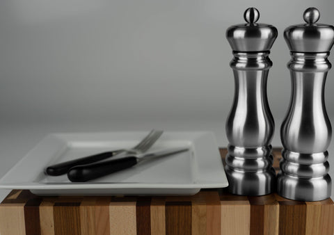 Stainless Steel salt and pepper mills in a kitchen