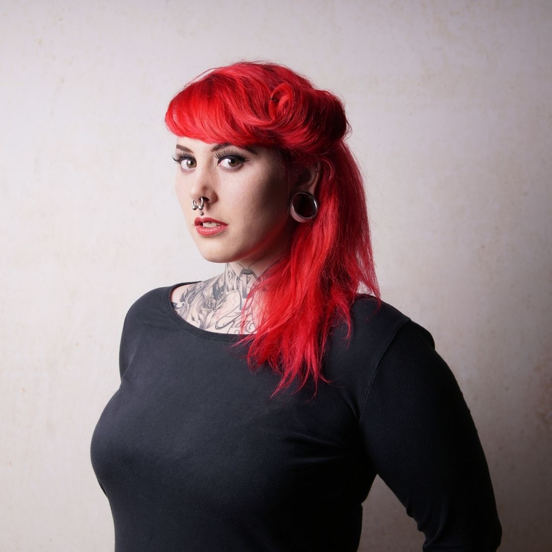red-haired-woman-with-a-medusa-piercing