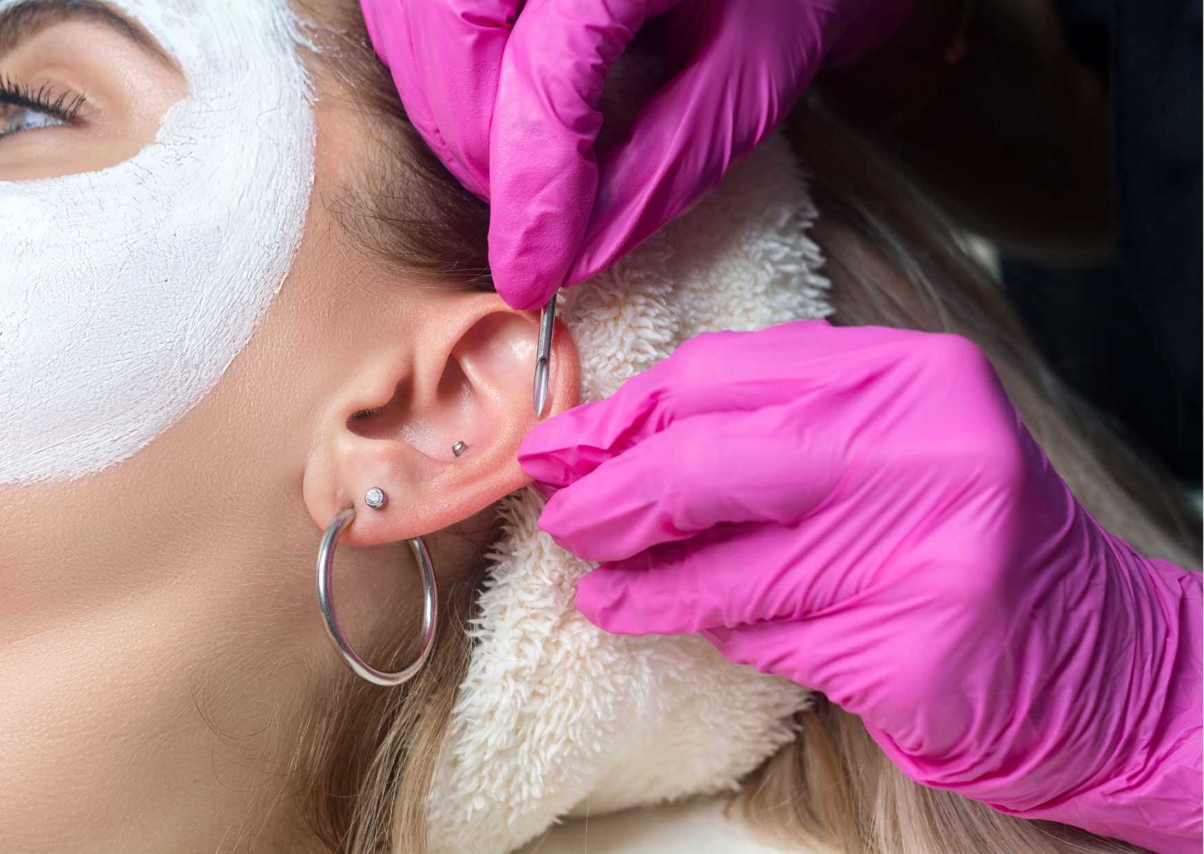 customer-getting-a-double-ear-piercing