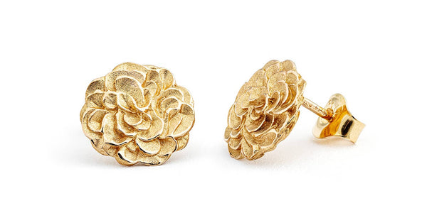 Golden stud earrings from the Eudora jewelry collection, design by Anu Kaartinen