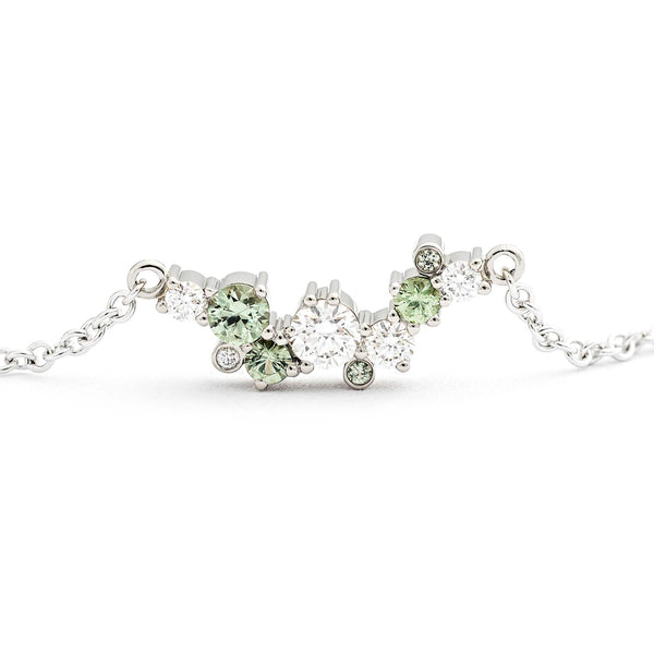 Keto Meadow Spring collections necklace with pastel green sapphires and white diamonds, design by Jussi Louesalmi