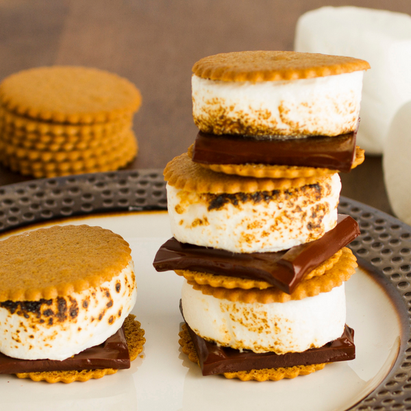 Dewey's Triple Ginger Moravian Cookie Thins sandwiching a crispy marshmallow and chunk of chocolate