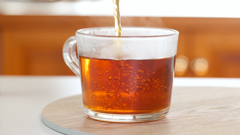 Black Tea Poured Into Clear Glass Mug | TEA MATE Australia
