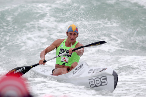 Ali Day Pro Surf Ironman paddling during a NutriGrain Ironman Series race