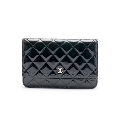 A BLACK PATENT LEATHER WALLET ON CHAIN FLAP BAG, CHANEL, 2008-09