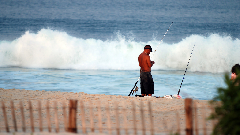 Man surf fishing