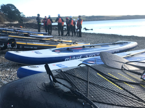 teaching people to paddleboard