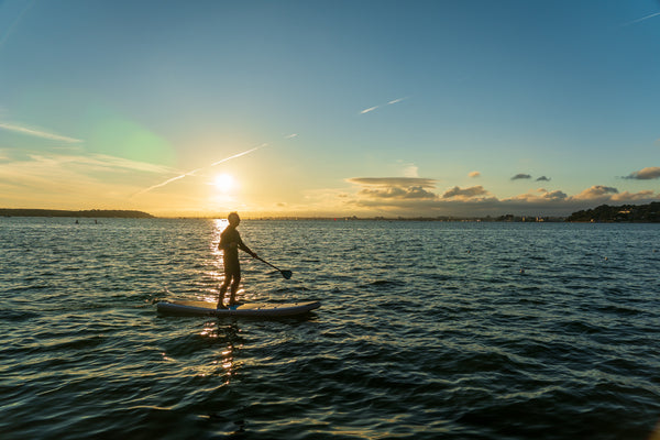 Paddleboarding during the sunset