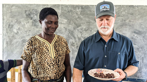 Lead Farmer Mama Mpoki and Shawn Askinosie with chocolate samples
