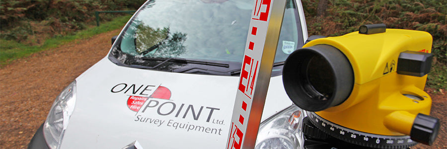 One + Point Ltd van alongside staff and level.