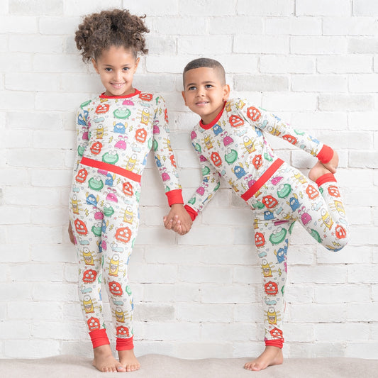 • Toddler Toothed Green Dino • ‘Sleep Tight’ Two-Piece Bamboo Pajama and  Playtime Set