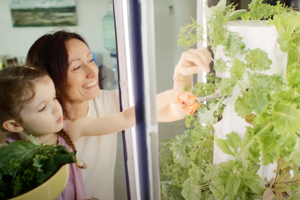 mum and child gardening vegan