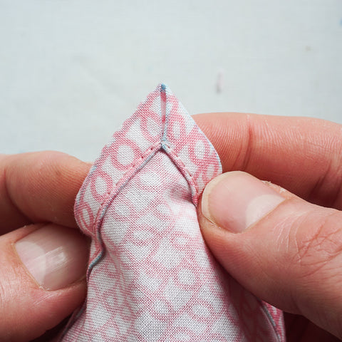 how to sew a mitered corner on a double fold hem