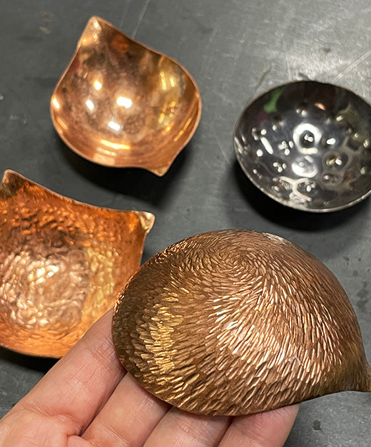 4 copper bowls textured with different hammers, handmade in C Grisez art studio