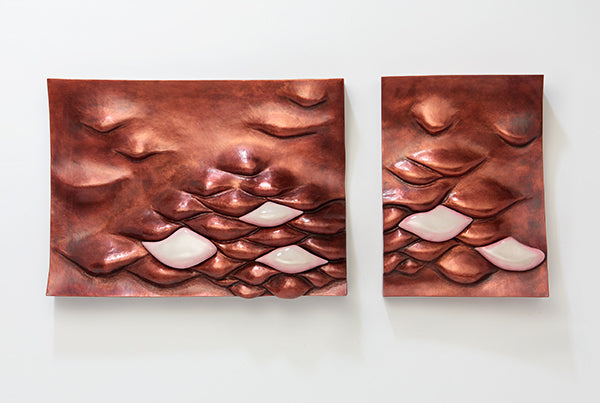 2 part copper and pink enamel wall sculpture with relief style droops and bulges