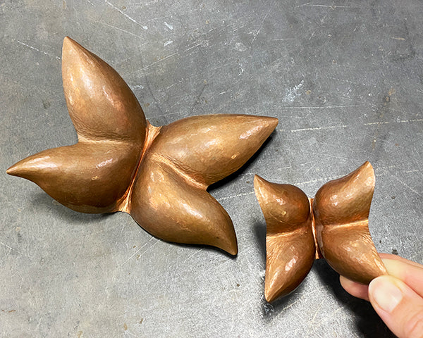 hammered abstract copper butterflies handcrafted by CG Sculpture and Jewelry in Seattle