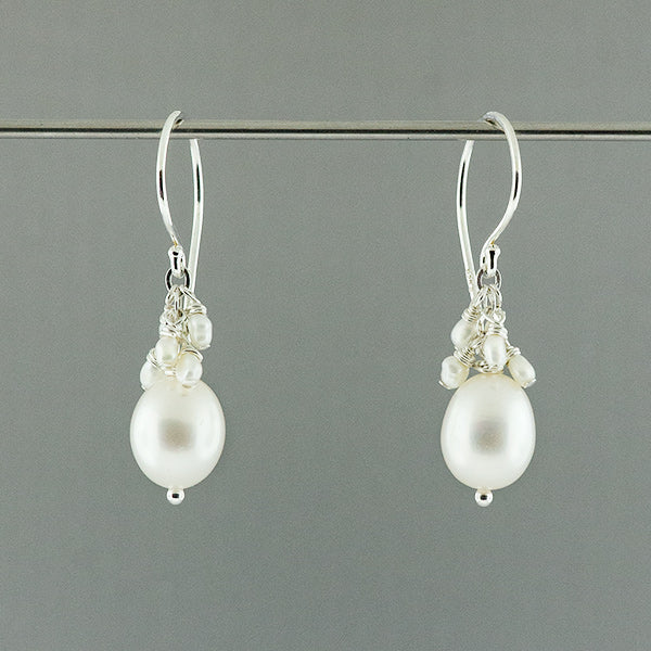 sterling silver and white fresh water pearls dangle earring