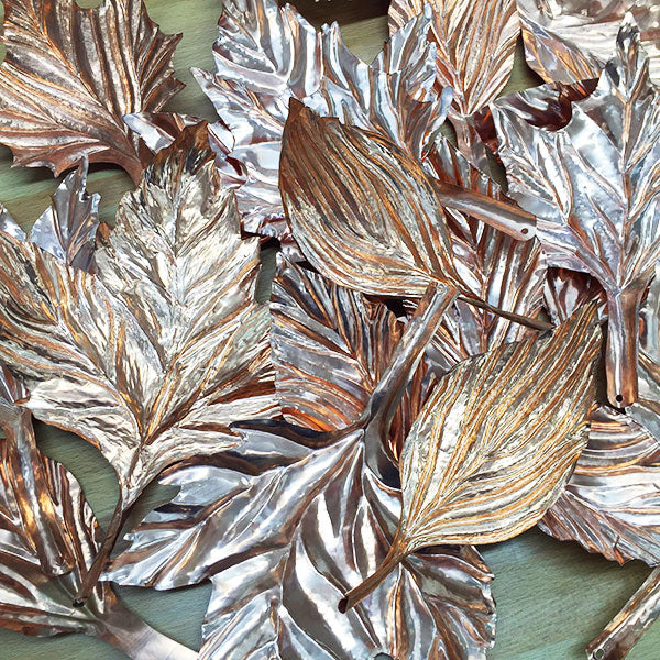 hammered copper leaves for collaborative public sculpture titled Part You