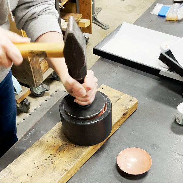 hammering little copper bowls for salt cellars or spice bowls CG Sculpture and Jewelry