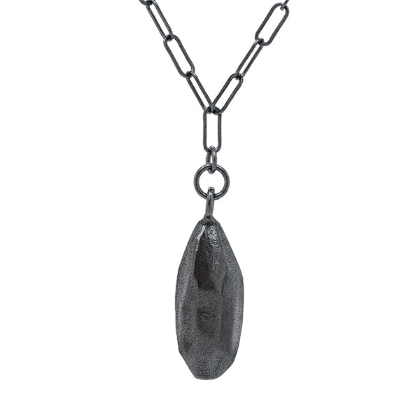 darkened sterling silver small rock droplet necklace handcrafted in Seattle by artist Catherine Grisez