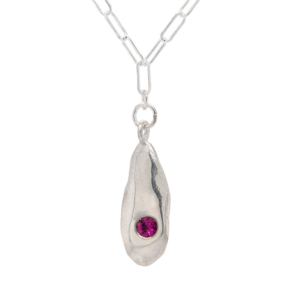 strength droplet necklace in sterling silver and pink tourmaline, a rock that symbolizes strength, handmade in Seattle