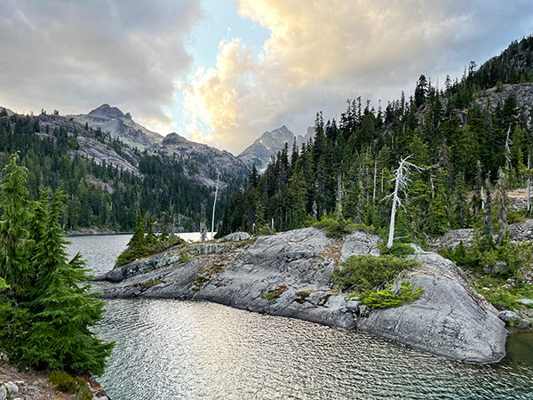 Dramatic sky over Spectacle Lake on PCT backpacking adventure