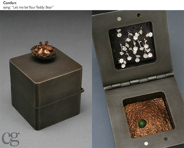 bronze bird nest and steel and silver and jade music box sculpture