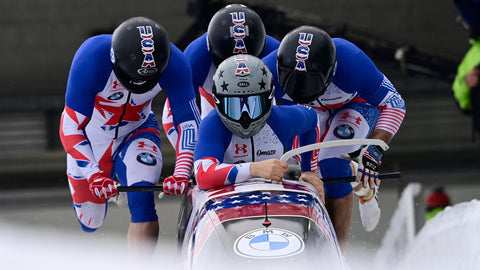 Hunter Church and teammates competing in bobsled competition