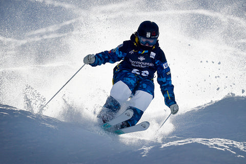 Olivia Giaccio competing in women's moguls freestyle skiing 