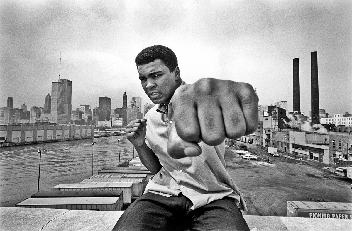 Muhammad Ali overlooking the Chicago River and the city's skyline. 1966