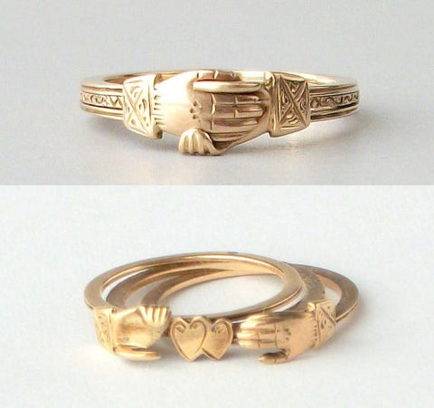 Gimmel ring that springs apart to reveal 2 hearts joined within