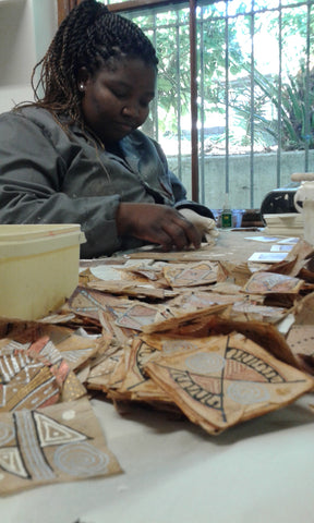 Artisan at Original T-Bag design making tea lights #Blacklivesmatter