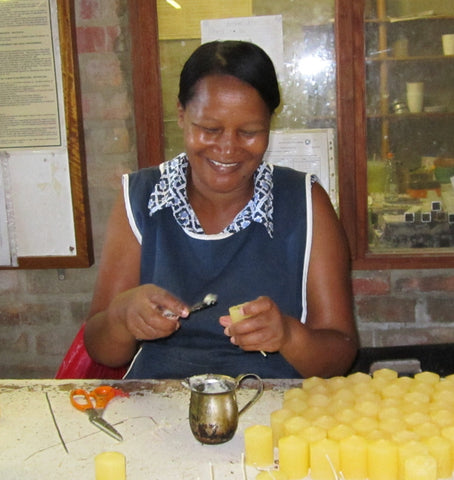 Annelee, an artisan at Kapula making Fair Trade Candles #Blacklivesmatter