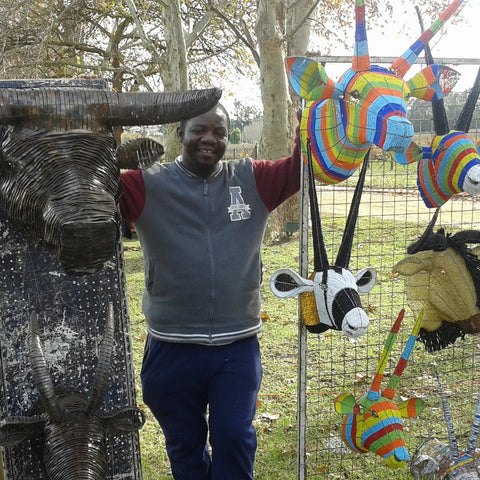 Gofrey with his hand crafted animals from recycled materials #Blacklivesmatter