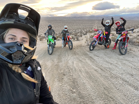 Group of five friends sitting on dirt bike in Spangler Hills.