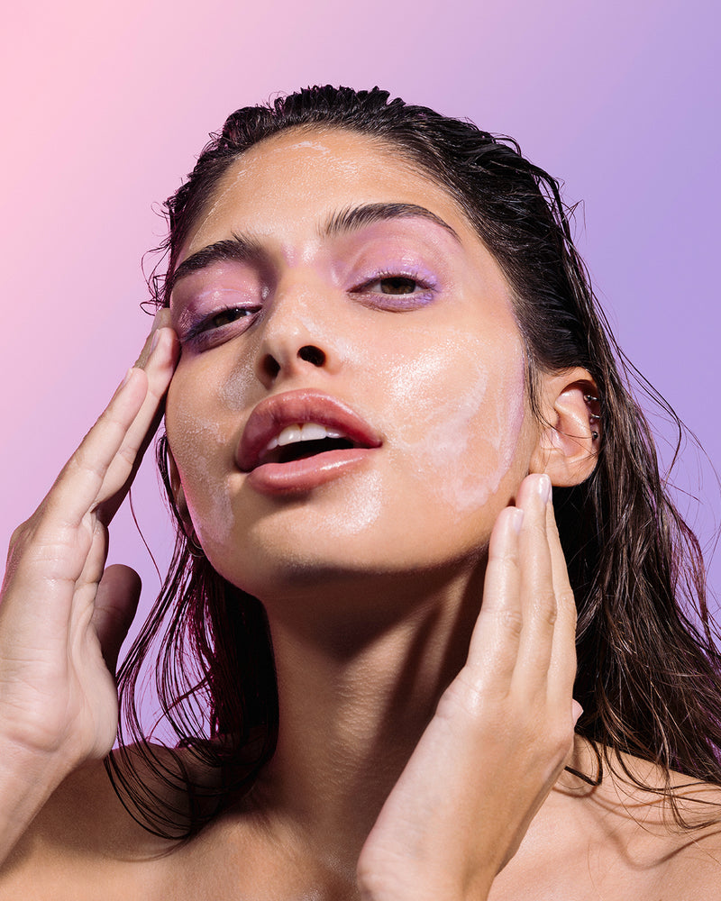 model removing makeup with blueberry bounce cleanser