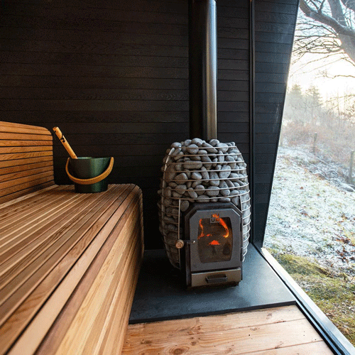 A Burn Bin That Has Been Used To Burn Wood, Paper And Other