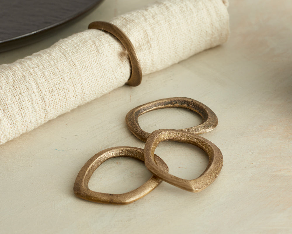 What a Host Home: Brass Napkin rings holder in gold colour